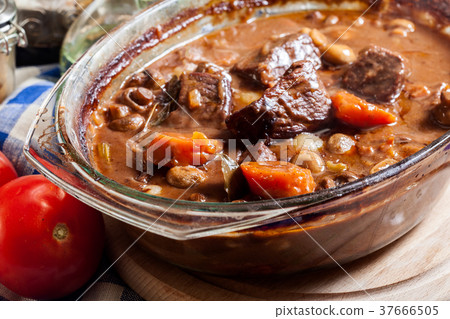 Beef Bourguignon stew in a casserole dish Beef Bourguignon stew in a casserole dish 37666505
