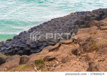 Crescent shaped hexagonal rock formations Crescent shaped hexagonal rock formations 37666824