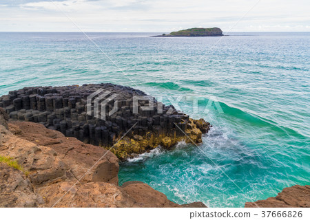 Crescent shaped hexagonal rock formations Crescent shaped hexagonal rock formations 37666826