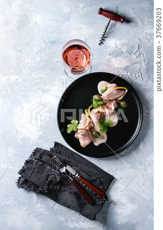 Veal with tuna sauce vitello tonnato 37669203