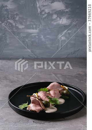 Veal with tuna sauce vitello tonnato 37669218