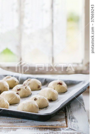 Raw unbaked buns Raw unbaked buns 37669243