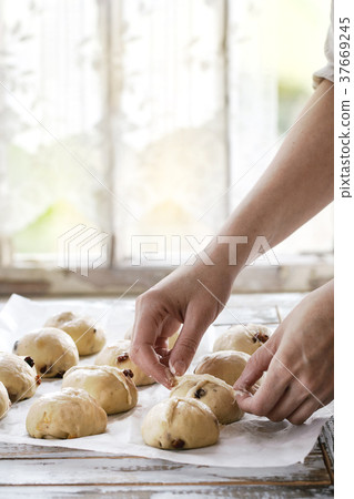 Raw unbaked buns Raw unbaked buns 37669245