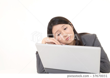 Tired business looking woman 37670031