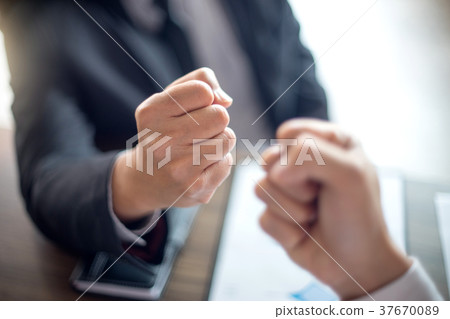 two business man use hand to fist bump two business man use hand to fist bump 37670089