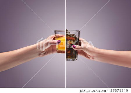 beautiful woman holding orange juice beautiful woman holding orange juice 37671349