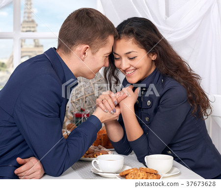 happy couple drinking tea indoor happy couple drinking tea indoor 37673628