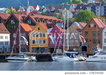 Bryggen street with boats in Bergen, Norway 37674500