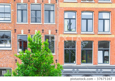 Traditional dutch medieval houses in Amsterdam Traditional dutch medieval houses in Amsterdam 37675167