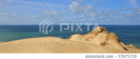 Blue sea Vesterhavet and sand dune.  37675729