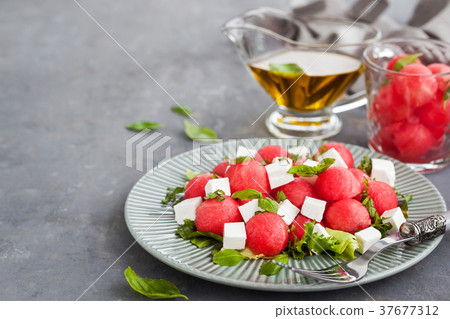 Fresh delicious salad with watermelon and feta Fresh delicious salad with watermelon and feta 37677312