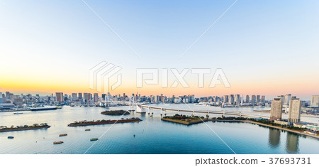 tokyo tower & rainbow bridge in Odaiba at sunset tokyo tower & rainbow bridge in Odaiba at sunset 37693731