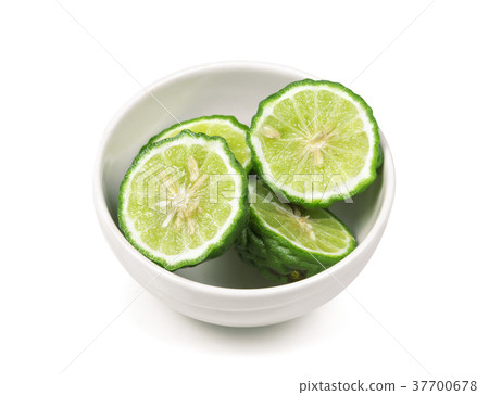 sliced fresh bergamot in the white bowl isolated sliced fresh bergamot in the white bowl isolated 37700678