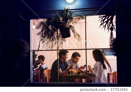 Asian people eating party in a restaurant Asian people eating party in a restaurant 37701992