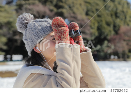 Observe with binoculars 37702652