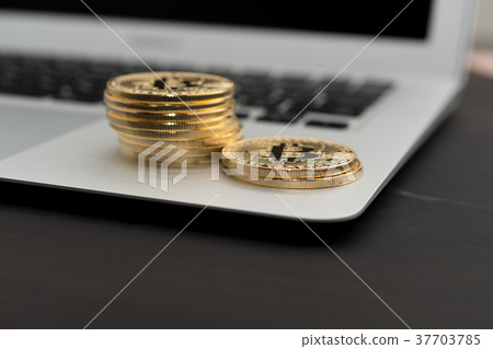 Image of virtual currency · bit coin and personal computer Image of virtual currency · bit coin and personal computer 37703785