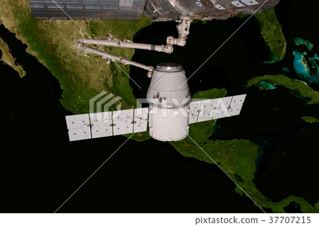 SpaceX Dragon orbiting the planet Earth. 37707215