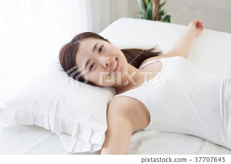 Woman doing gymnastics with bet 37707645