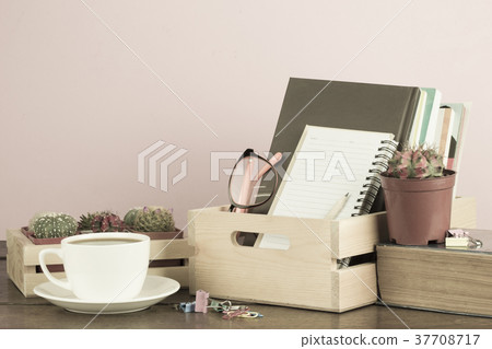 Black coffee with stationary on wooden table with 37708717