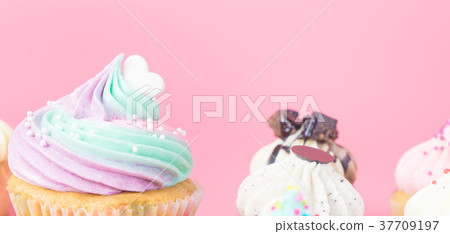 Top of cupcake with heart on pink for love Top of cupcake with heart on pink for love 37709197