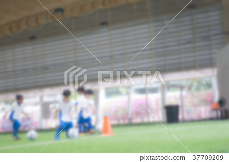 Kid soccer training field blurred for abstract Kid soccer training field blurred for abstract 37709209