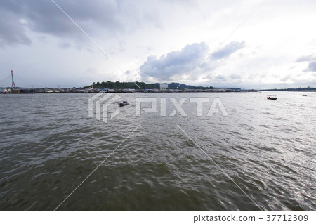 Water taxi running along the Brunei river Water taxi running along the Brunei river 37712309