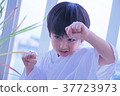 A boy imitating karate performer 37723973