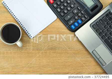 Laptop computer or notebook, calculator and coffee Laptop computer or notebook, calculator and coffee 37724495