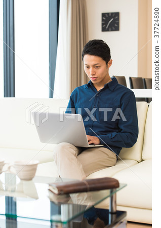 A man who operates a personal computer A man who operates a personal computer 37724890