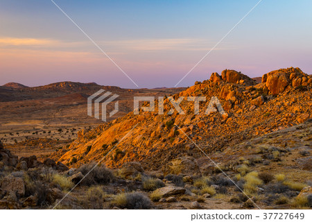 Rocky desert at dusk 37727649