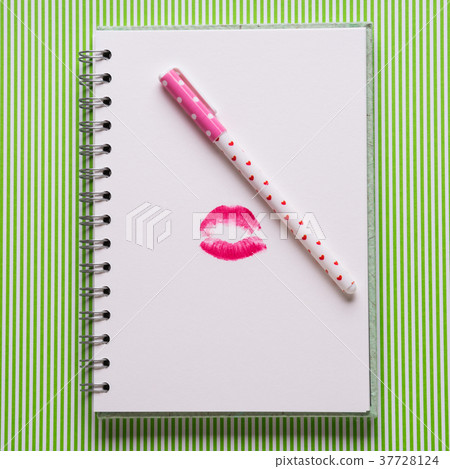 White page with girlish pen and kiss 37728124
