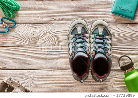 Travel items for hiking over wooden background Travel items for hiking over wooden background 37729899