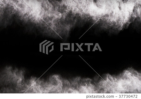 White powder on the black background. 37730472