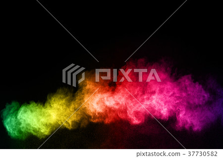 Explosion of colored powder on black background. 37730582
