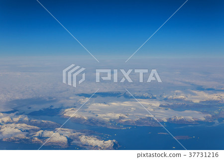 view from the airplane window the snow 37731216