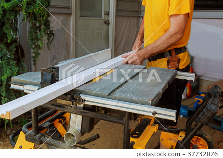 handyman cutting Picture Moulding circular saw handyman cutting Picture Moulding circular saw 37732076