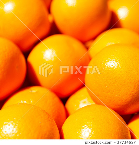 in the market lost of fresh orange 37734657