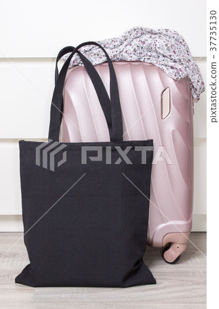 Black cotton eco tote bag with a travel suitcase Black cotton eco tote bag with a travel suitcase 37735130