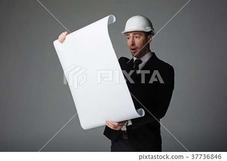 Surprised man watching at plan 37736846