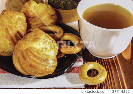 Still life with tea and cakes Still life with tea and cakes 37744232