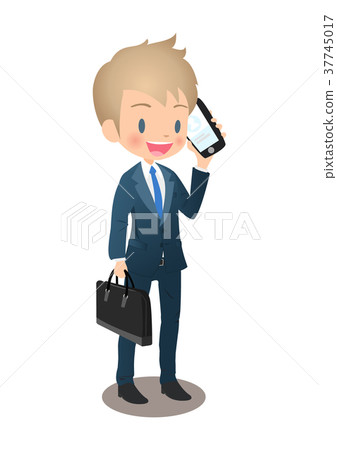 在衣服的年輕男性商人叫在通勤期間 在衣服的年輕男性商人叫在通勤期間 37745017