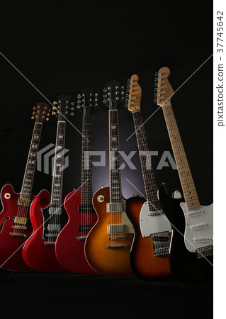 electric guitar in black background electric guitar in black background 37745642