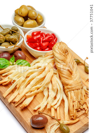 Smoked braided cheese and vegetables on white 37751041