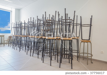 some stacked chairs 37756017