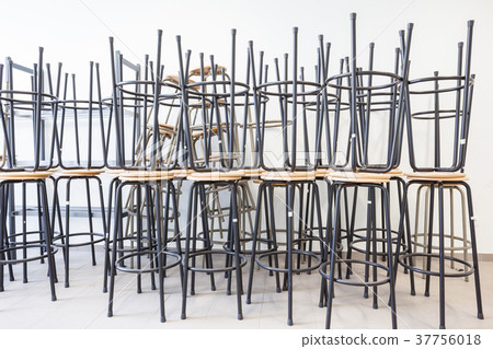 some stacked chairs 37756018