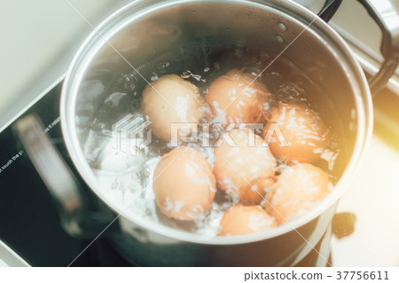 boiling eggs vintage color tone 37756611