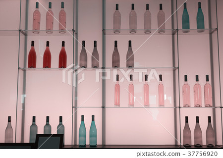 Shelves with bottles of alcohol drinks 37756920