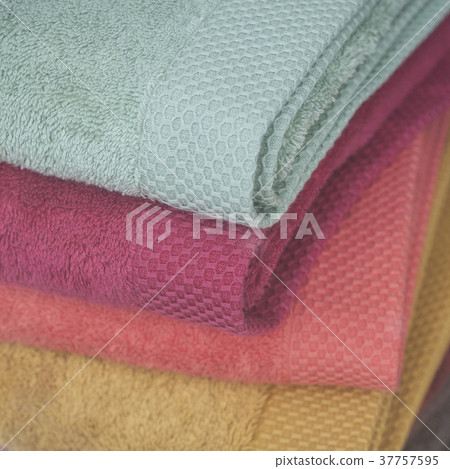 closeup of colorful bath towels pile in store 37757595