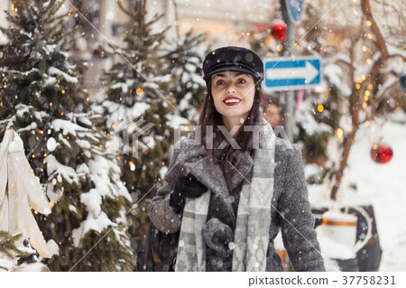 Pretty Christmas Woman Walks Pretty Christmas Woman Walks 37758231