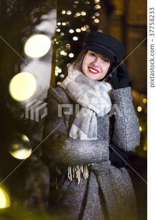 Girl near Garland Wall Girl near Garland Wall 37758233